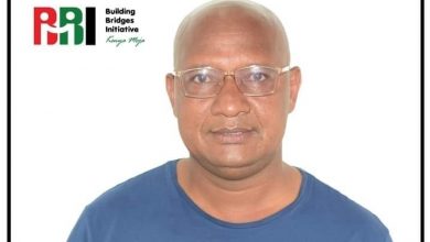 Photo of Gatina ward MCA David Ayoi drums up support for BBI as he issues bursaries to over 2000  students.