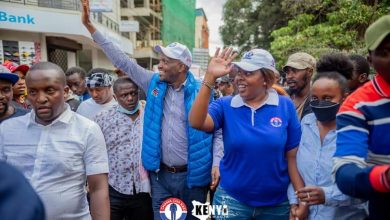 Photo of Moses Kuria and Julie Kabogo assures Gikomba traders of their support.